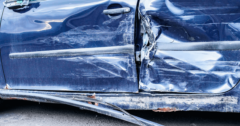 damage to side of blue car