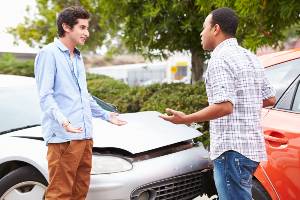 drivers outside of their cars after a crash