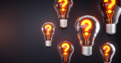 lightbulbs with lit up question marks