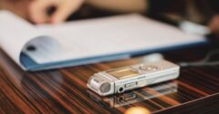 dictaphone on desk with notepad